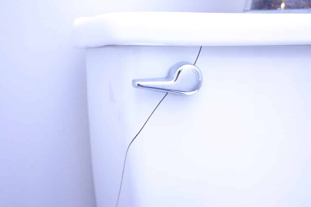 photo of a cracked toilet tank that needs repair in las vegas